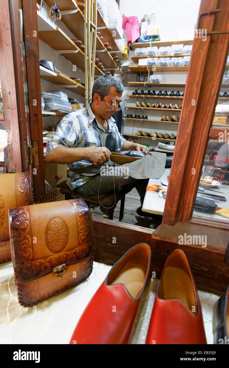 Shoemaker in Yemeniciler Bazaar or Yemeniciler Arastası, Safranbolu, Karabük province, Black Sea region, Turkey Stock Photo