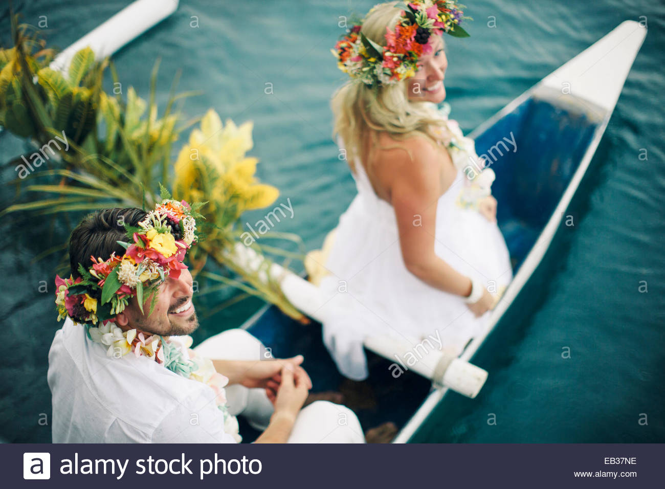 A Couple During Their Wedding Ceremony On Moorea Island French