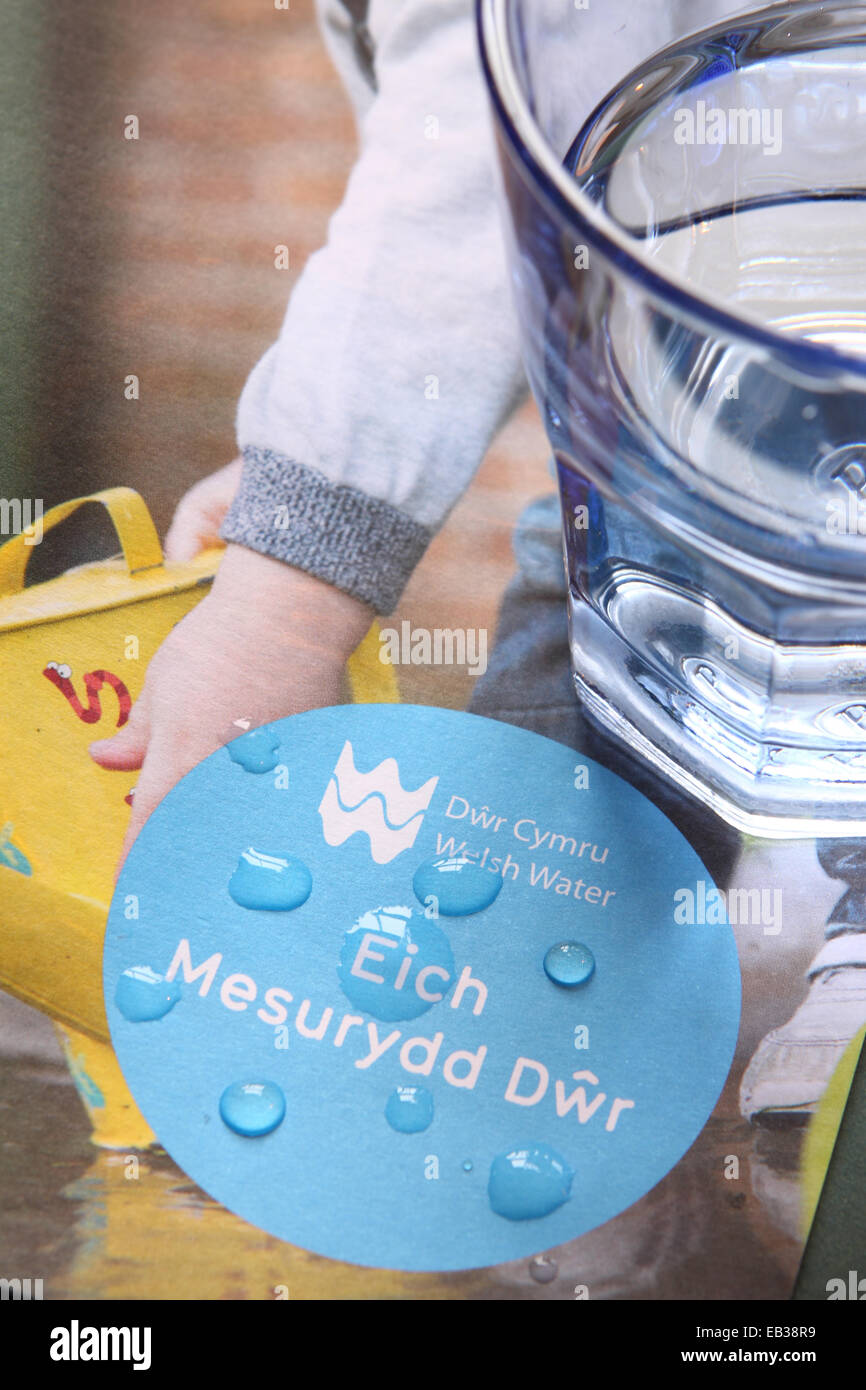 Welsh Water - Dwr Cymru water service provider with glass of water on leaflet Stock Photo