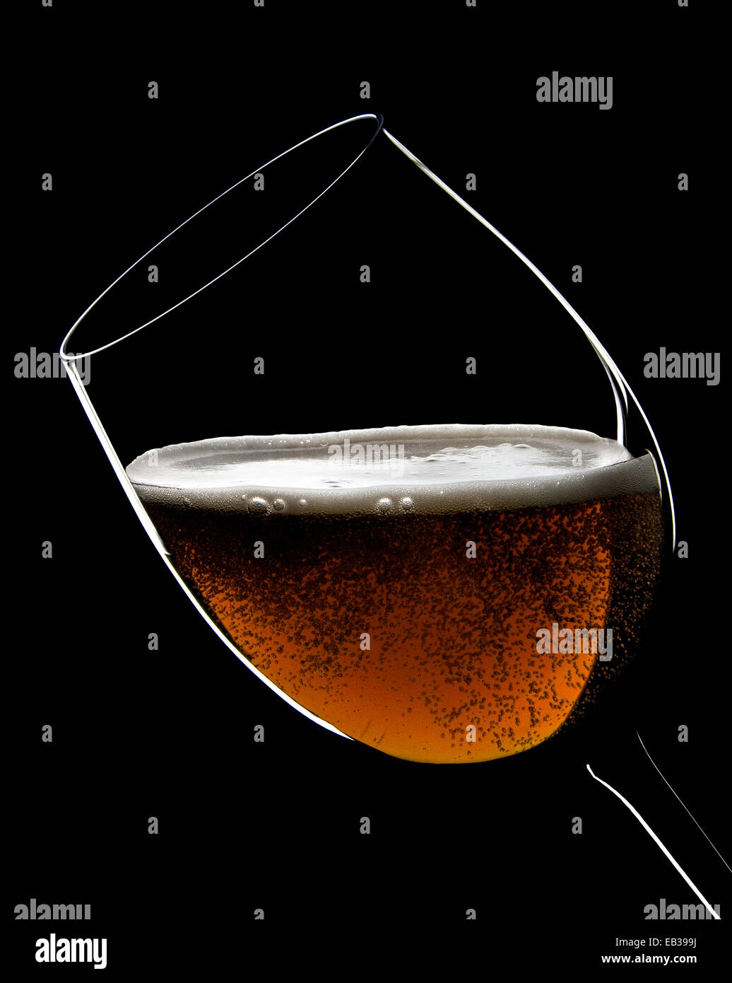 a glass of beer on black background Stock Photo