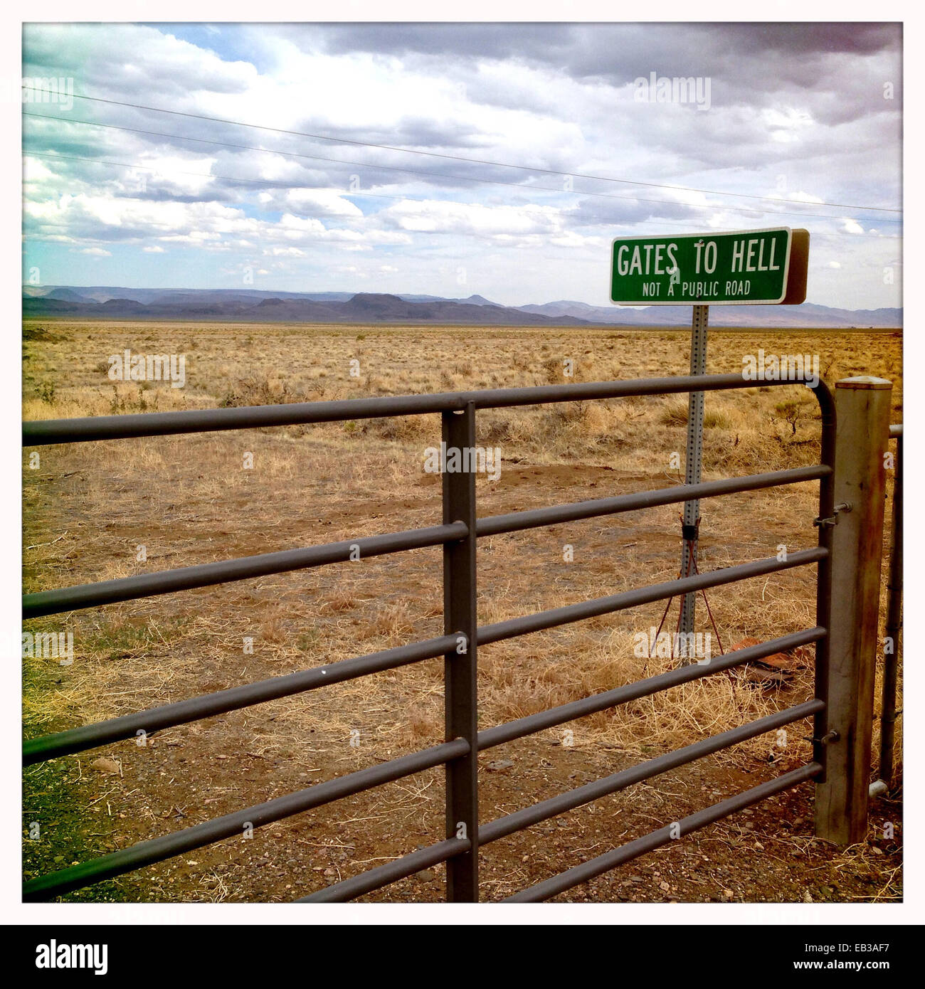 Sign for Gates to Hell in remote landscape Stock Photo