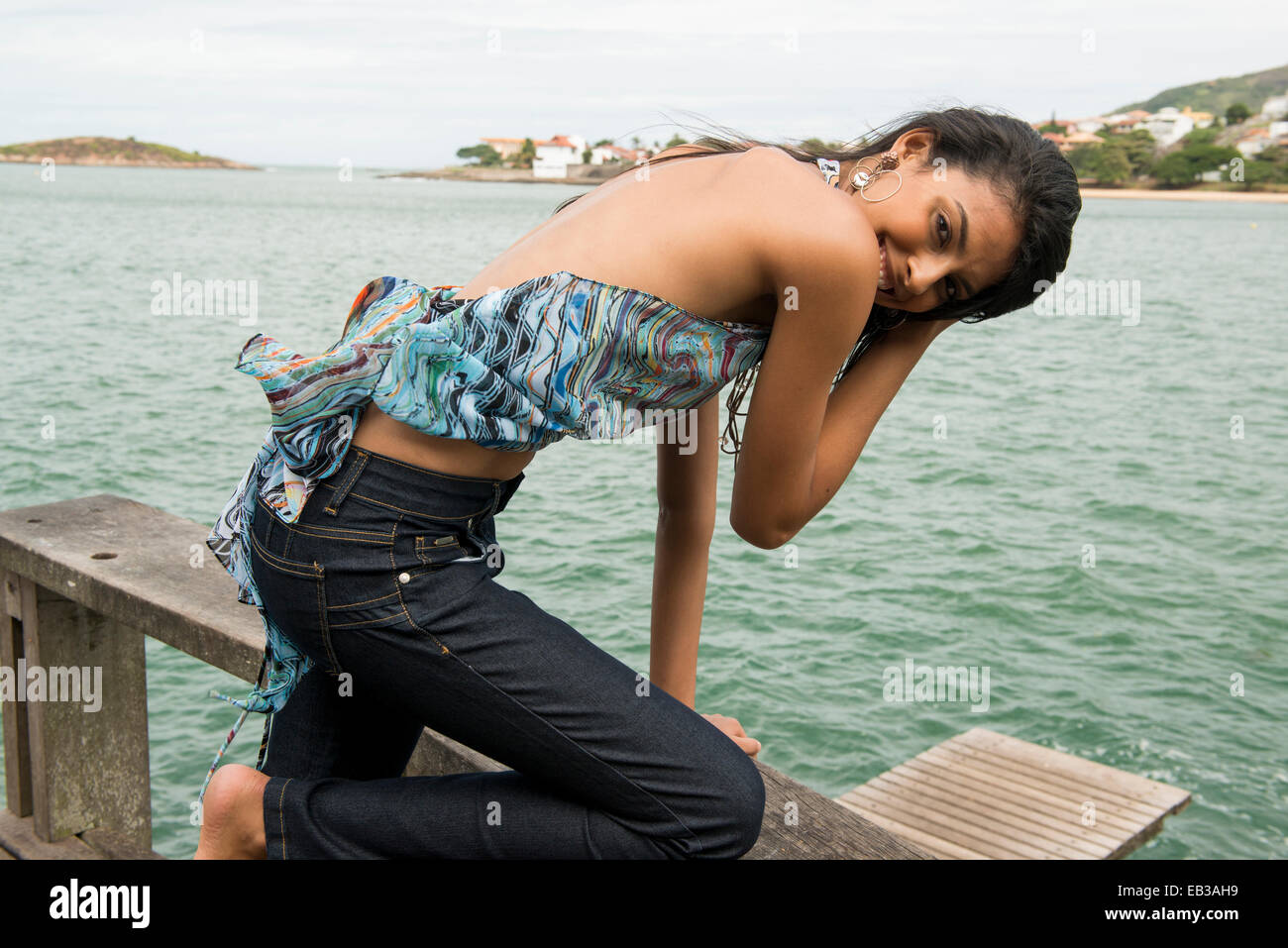 Kneeling woman hi-res stock photography and images - Alamy
