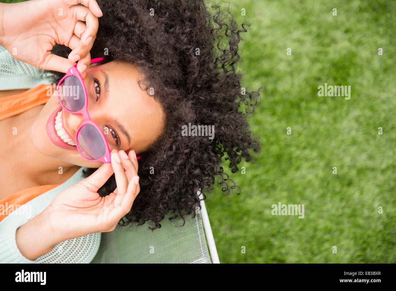 Woman with sunglasses hi-res stock photography and images - Alamy