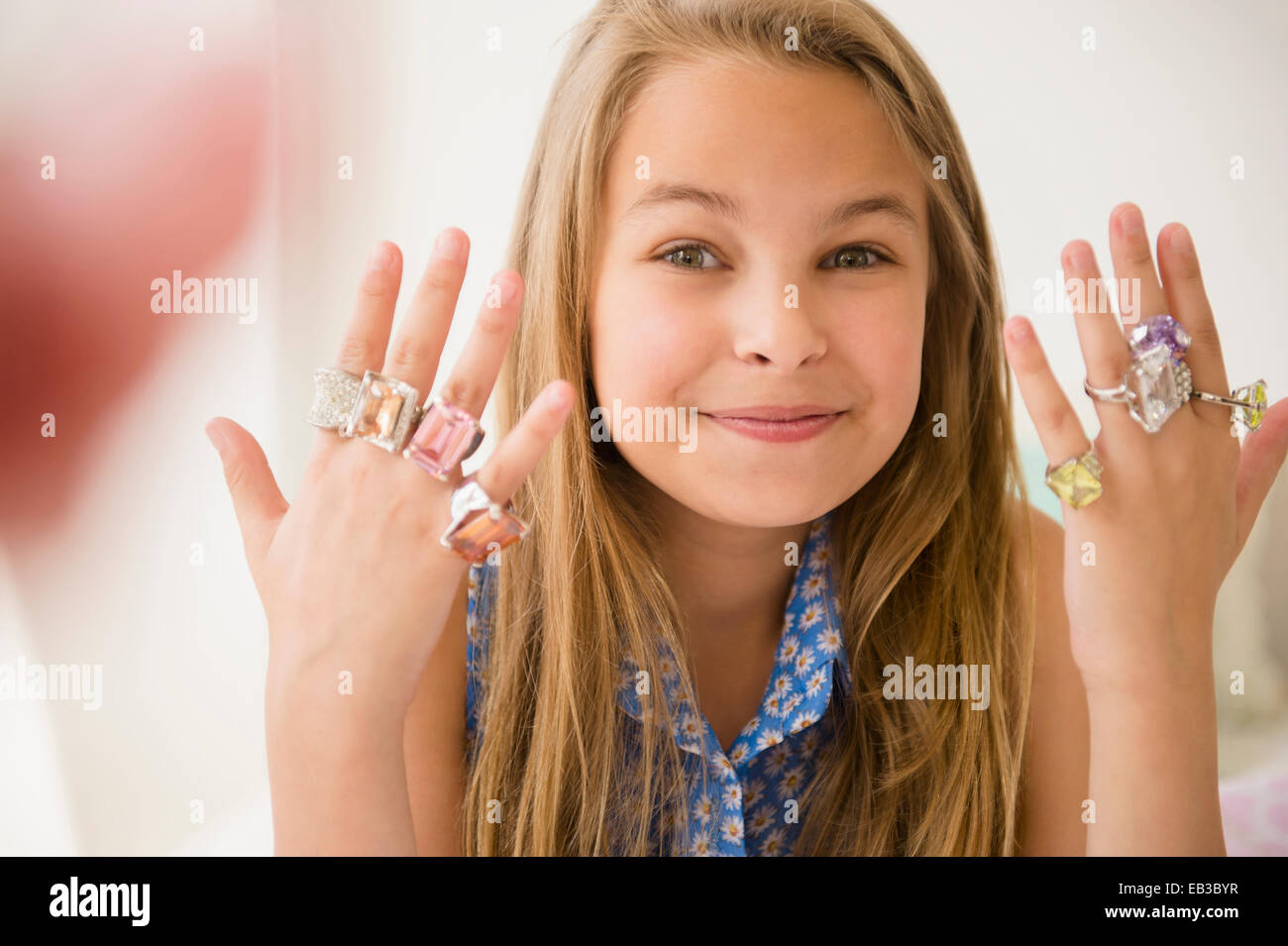 Caucasian girl wearing costume rings Stock Photo Alamy