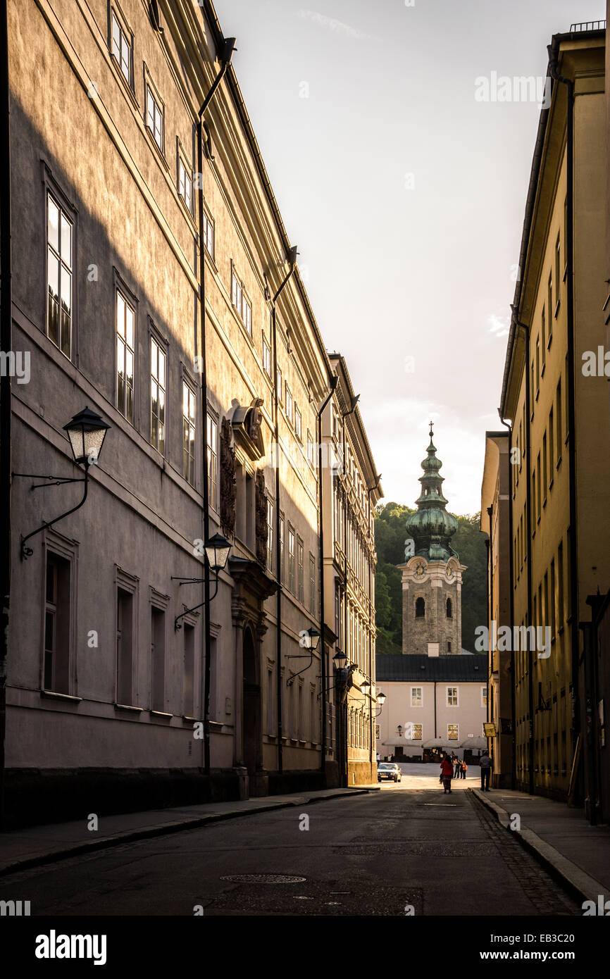 Austria, Salzburg, Golden light in streets Stock Photo