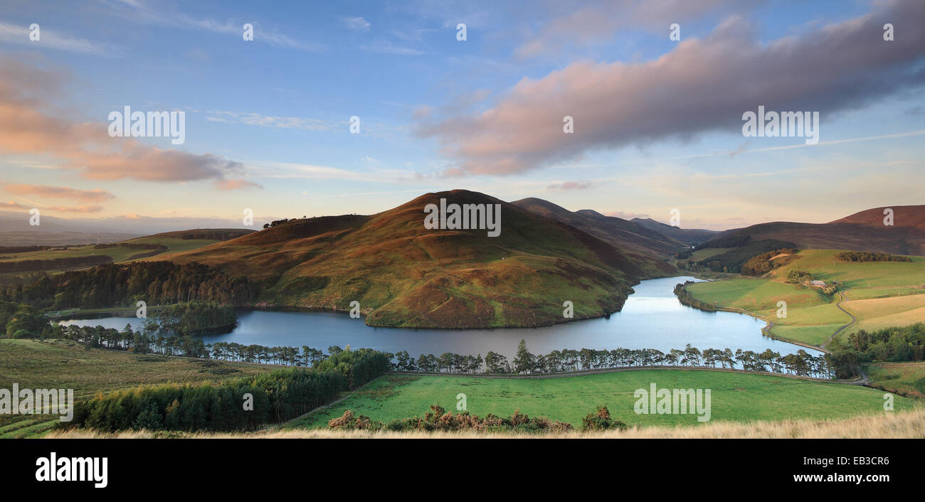 UK, Scotland, Midlothian, Auchendinny, Pentland Hills seen from across hillside fields and Glencorse reservoir Stock Photo