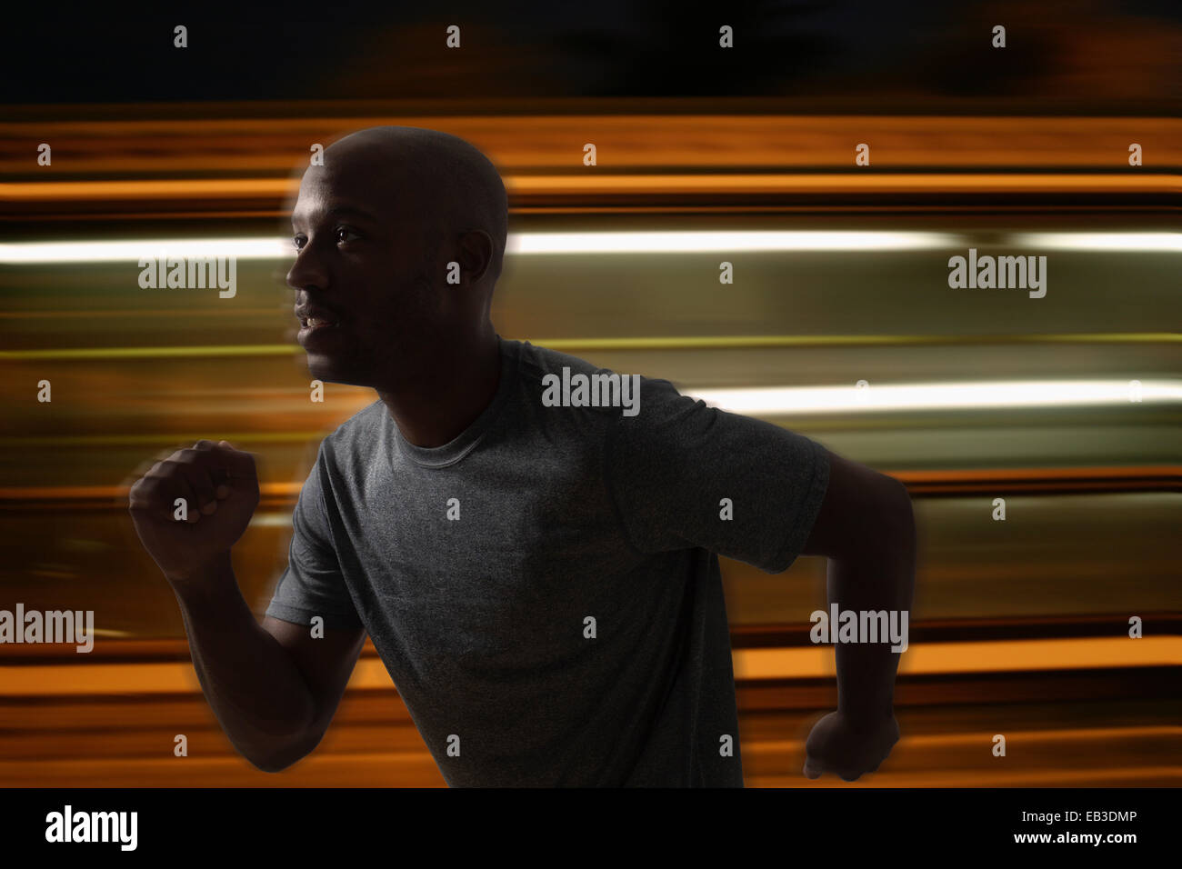Blurred view of Black man running Stock Photo