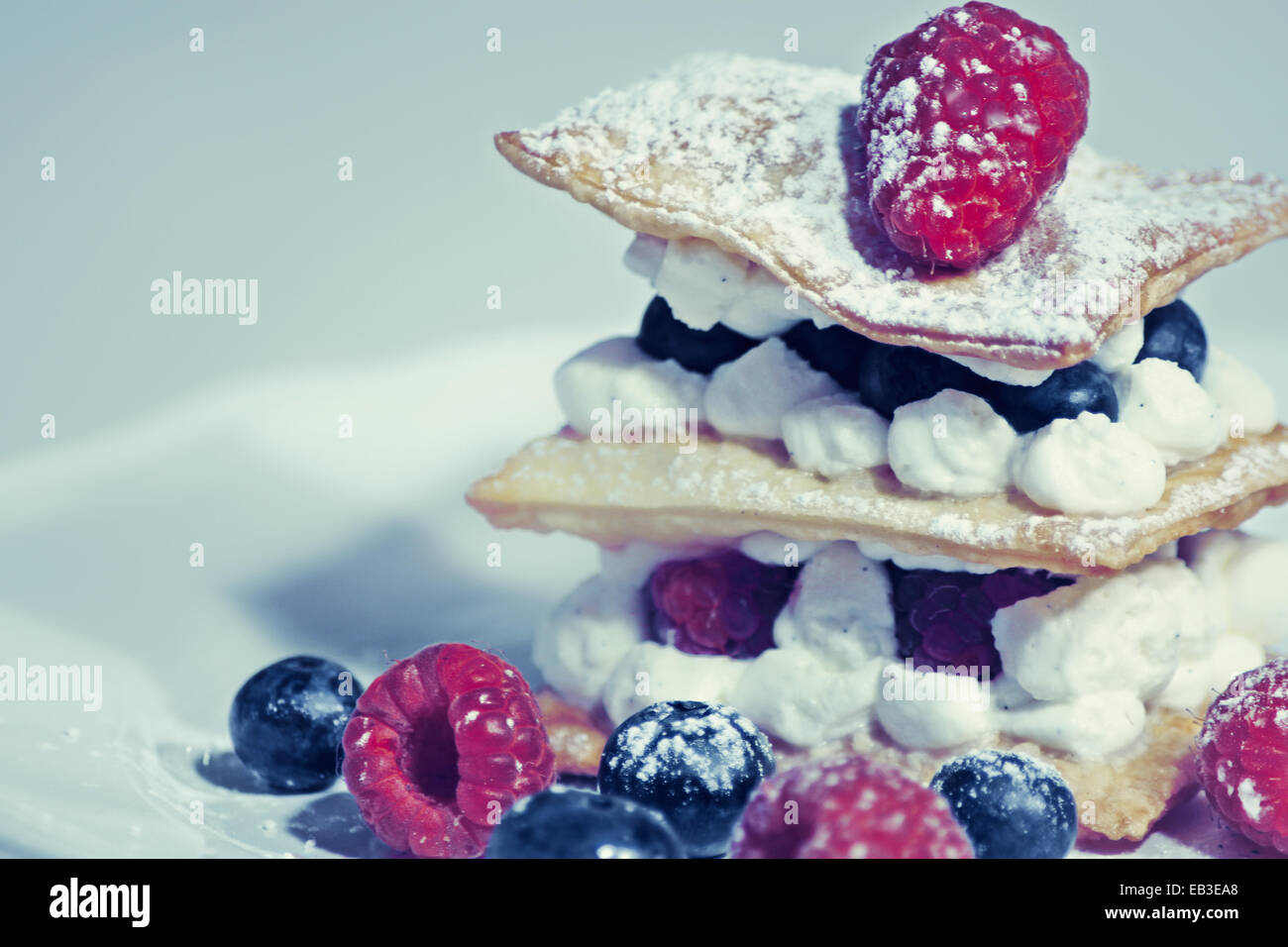 Mille-feuille pastry with summer fruits and whipped cream Stock Photo
