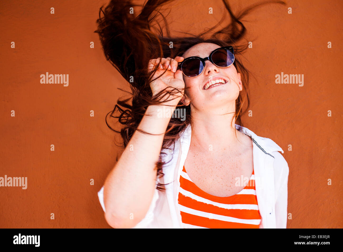 Woman wearing sunglasses hi-res stock photography and images - Alamy