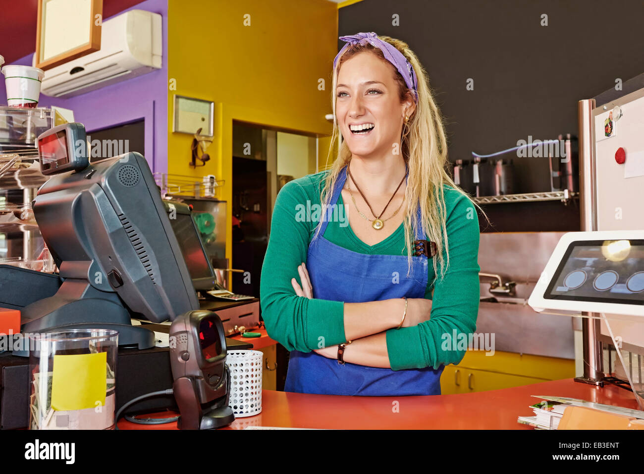 Caucasian woman working in cafe Stock Photo