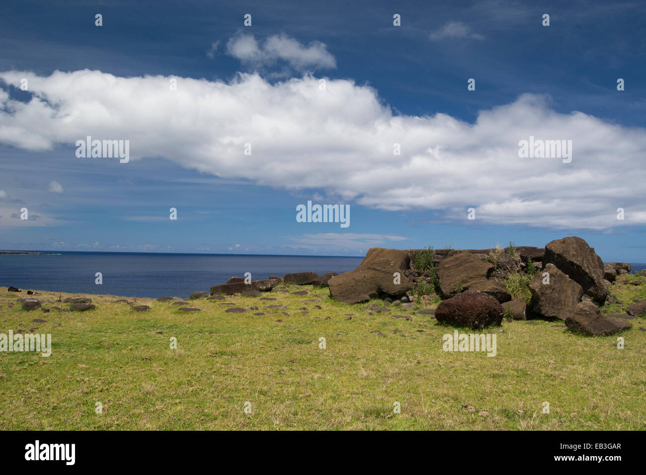 Chile, Easter Island aka Rapa Nui, Rapa Nui NP. Ahu Vinapu, important ceremonial center. Coastal view of platform with moi. Stock Photo