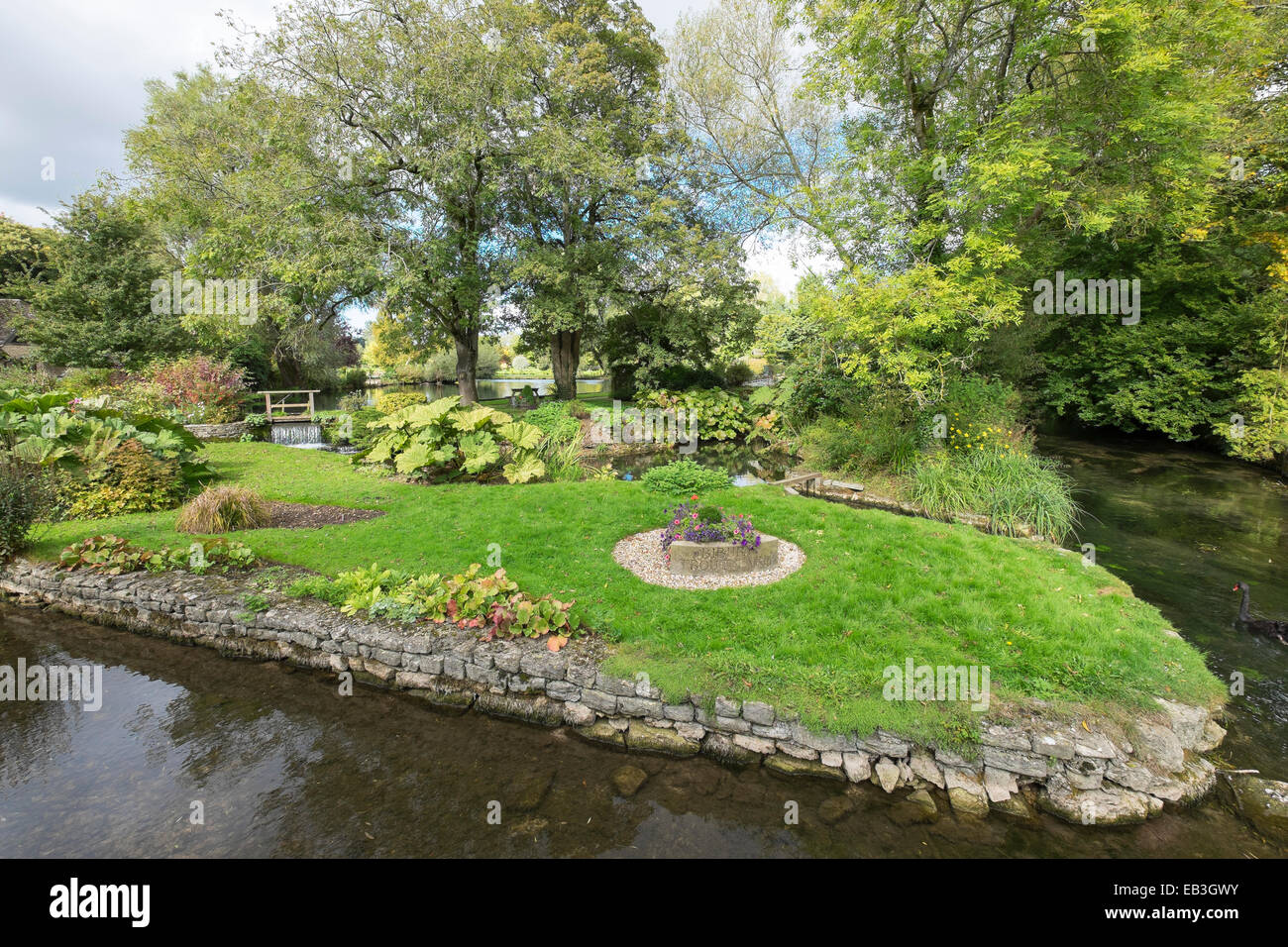 Trout farm gardens from road bridge Bibury Gloucestershire England