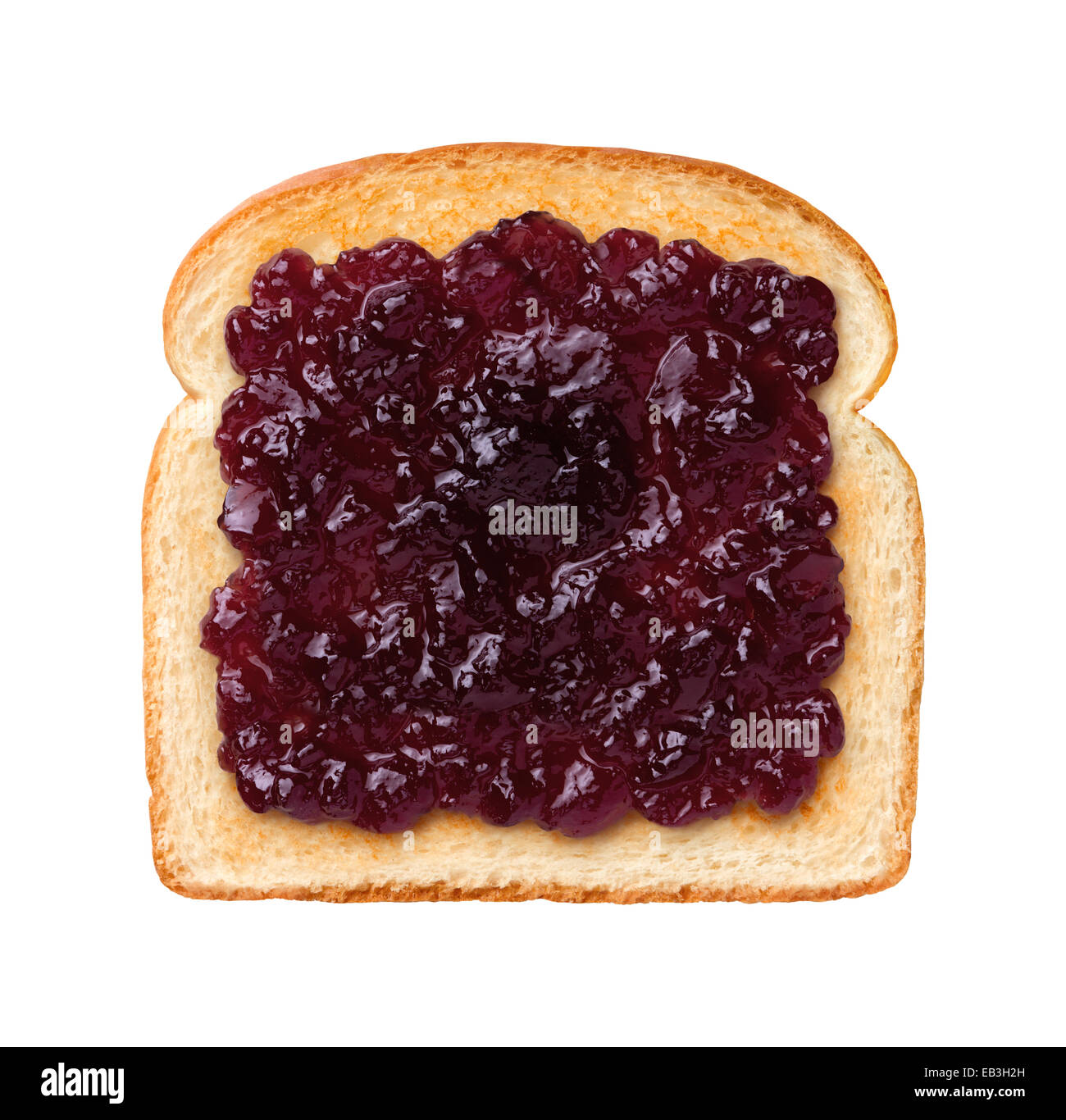 Aerial view of a single slice of Toast with grape jelly, or jam. Jelly is a sweet elastic spread made from fruit juice and sugar Stock Photo