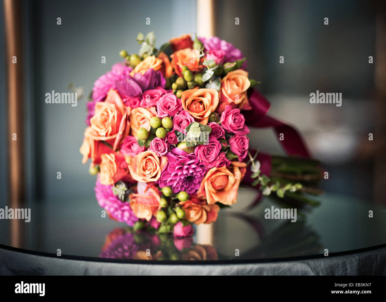 Bridal bouquet with pink and orange roses and flowers Stock Photo