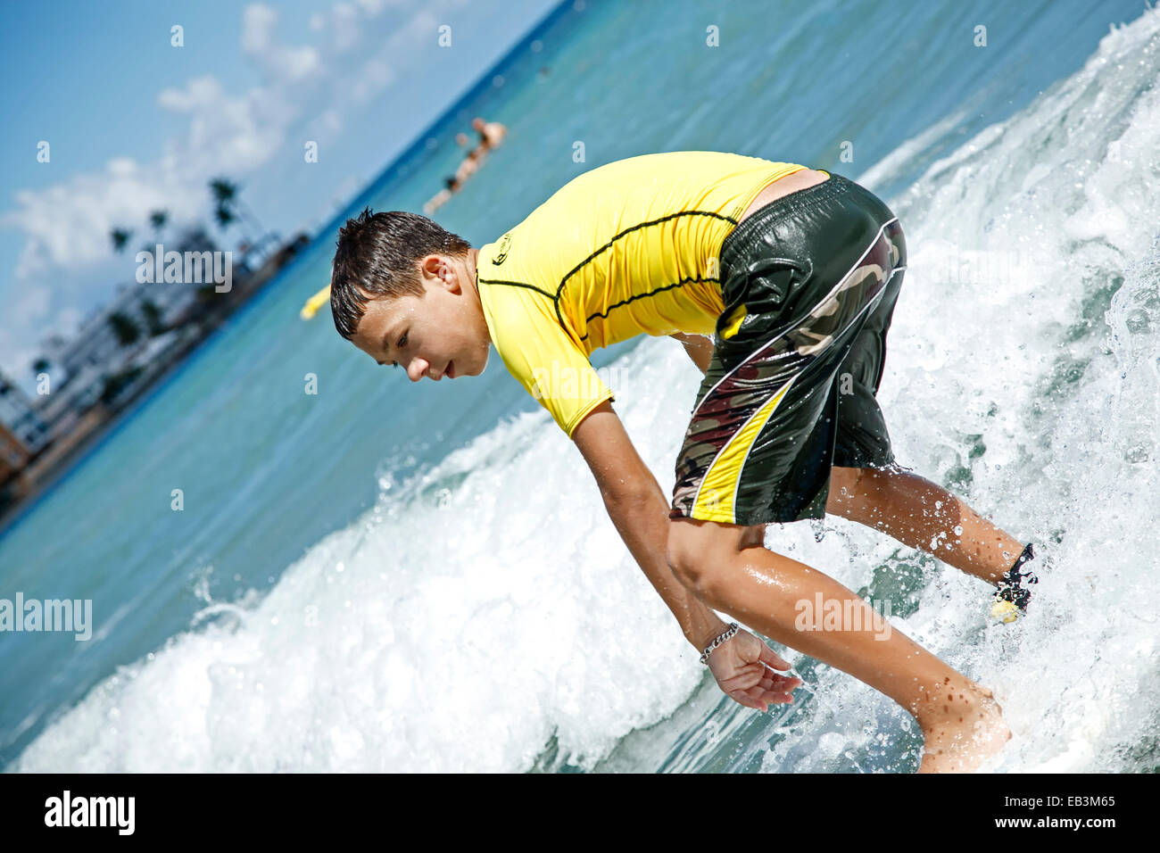 Boy surfing, Pine Grove Beach, Isla Verde, Puerto Rico Stock Photo Alamy