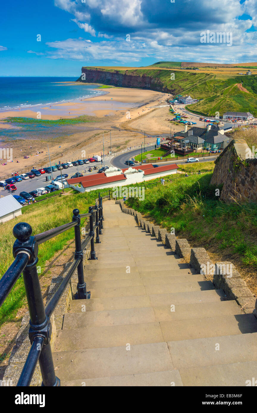 Steps with iron railings leading down towards beach Saltburn by the sea, holiday resort Stock Photo