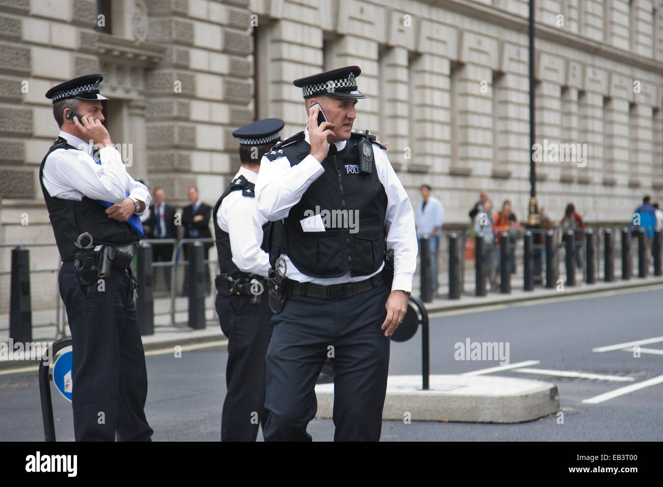 Metropolitan Police officers in the Whitehall area of London, England, UK Stock Photo