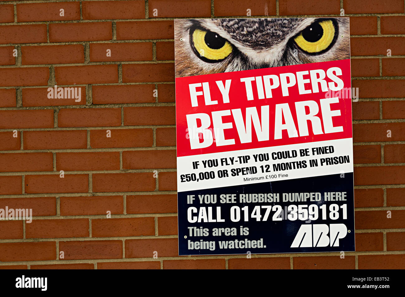 Fly tipping warning sign, Grimsby, Lincolnshire, England, UK Stock Photo