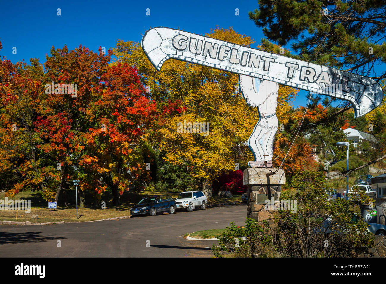 A sign at the entrance to the Gunflint Trail with fall foliage color in Grand Marais, Minnesota, USA. Stock Photo