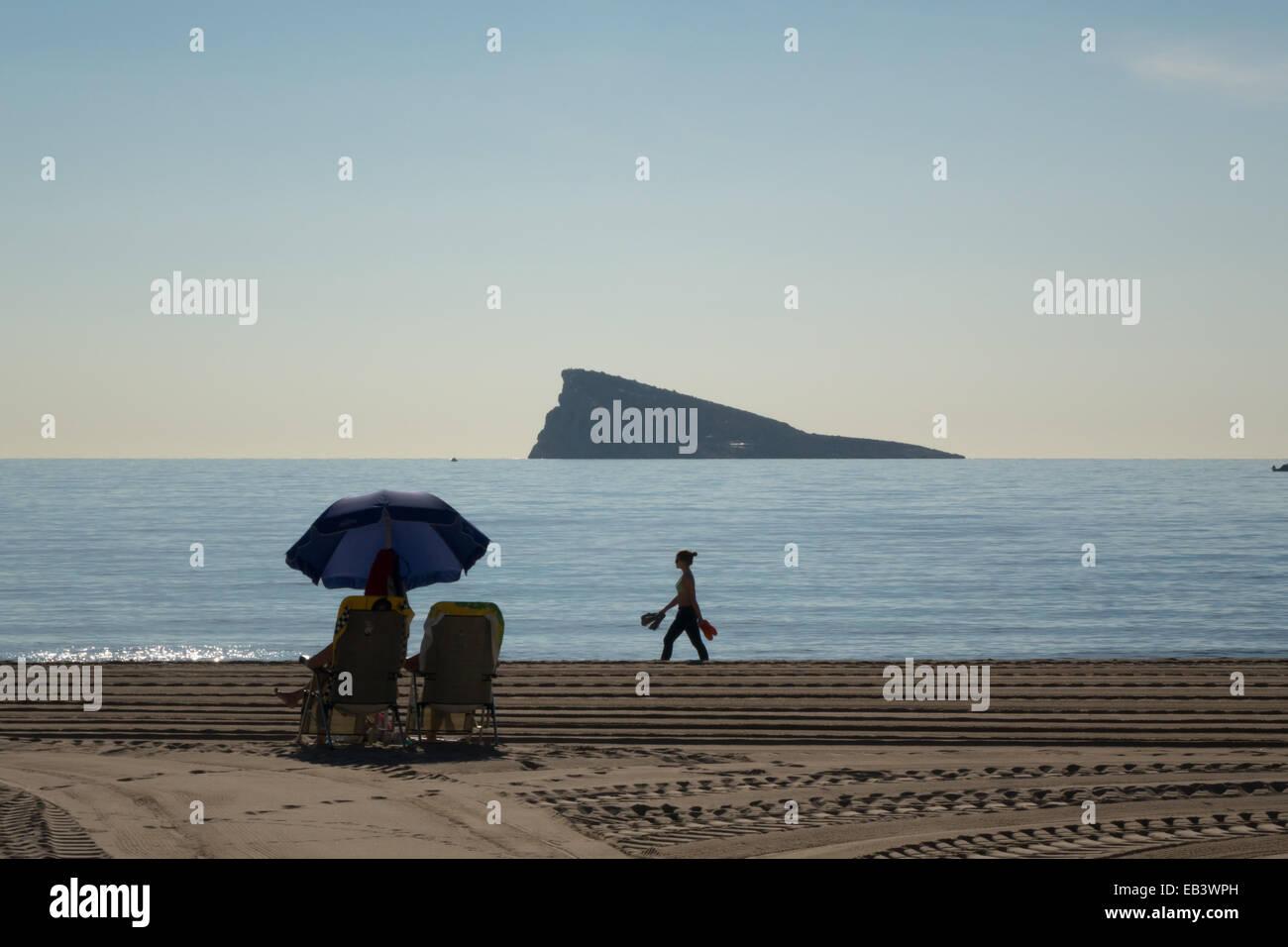 Benidorm, Costa Blanca, Spain, Europe, Beach view with Peacock Island and people on beach. Stock Photo