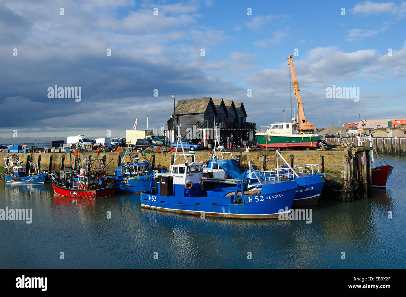 Fishing boats in Whitstable Harbour.  Whitstable is most noted for shellfish, Oly Ray and Cardium II are cockle dredgers. Stock Photo