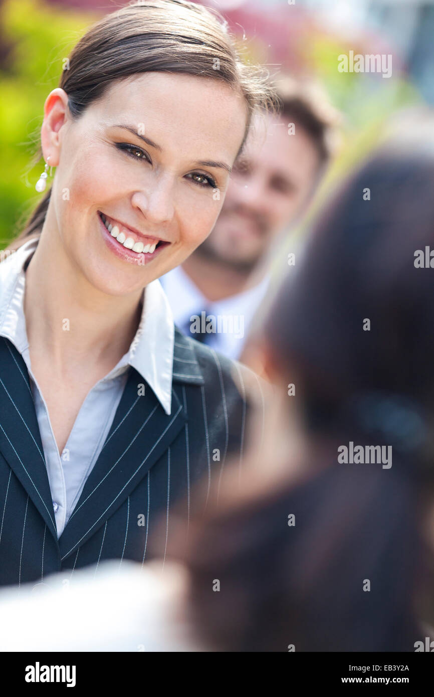 Portrait of a beautiful smiling young business woman or businesswoman ...