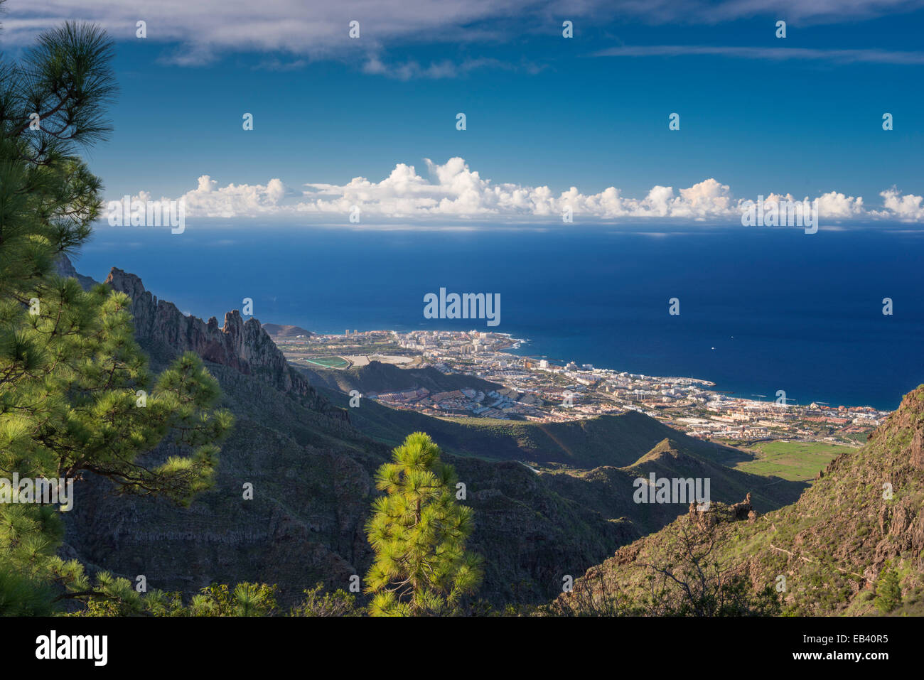 View to Playa Las Americas on the west coast of Tenerife over the gorges of Barranco del Agua and Barranco de Fanabe Stock Photo