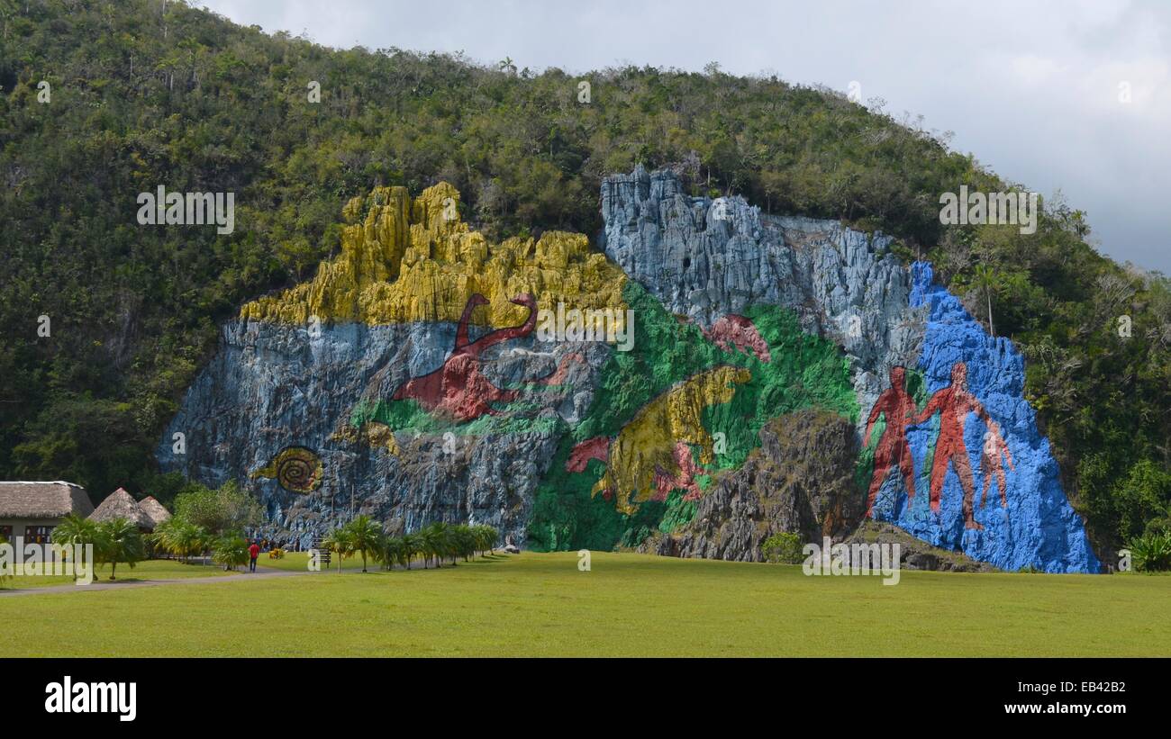 Mural de la Prehistoria, a giant mural painted on a cliff face in the Vinales area of Cuba. Stock Photo