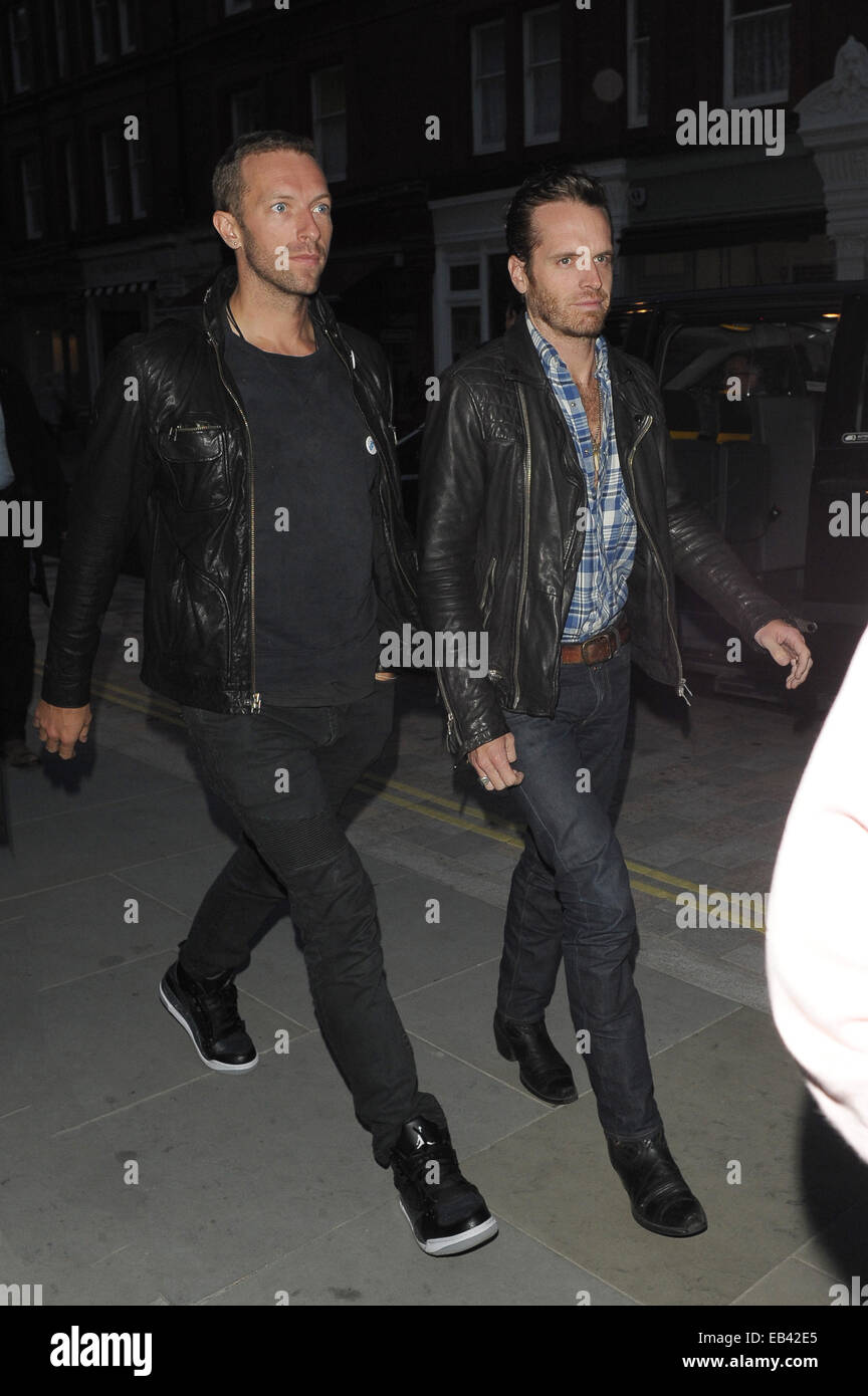 Chris Martin and Emily Blunt among celebrities spotted at Chiltern Firehouse  Featuring: Chris Martin,Guy Berryman Where: London, United Kingdom When: 23 May 2014 Stock Photo