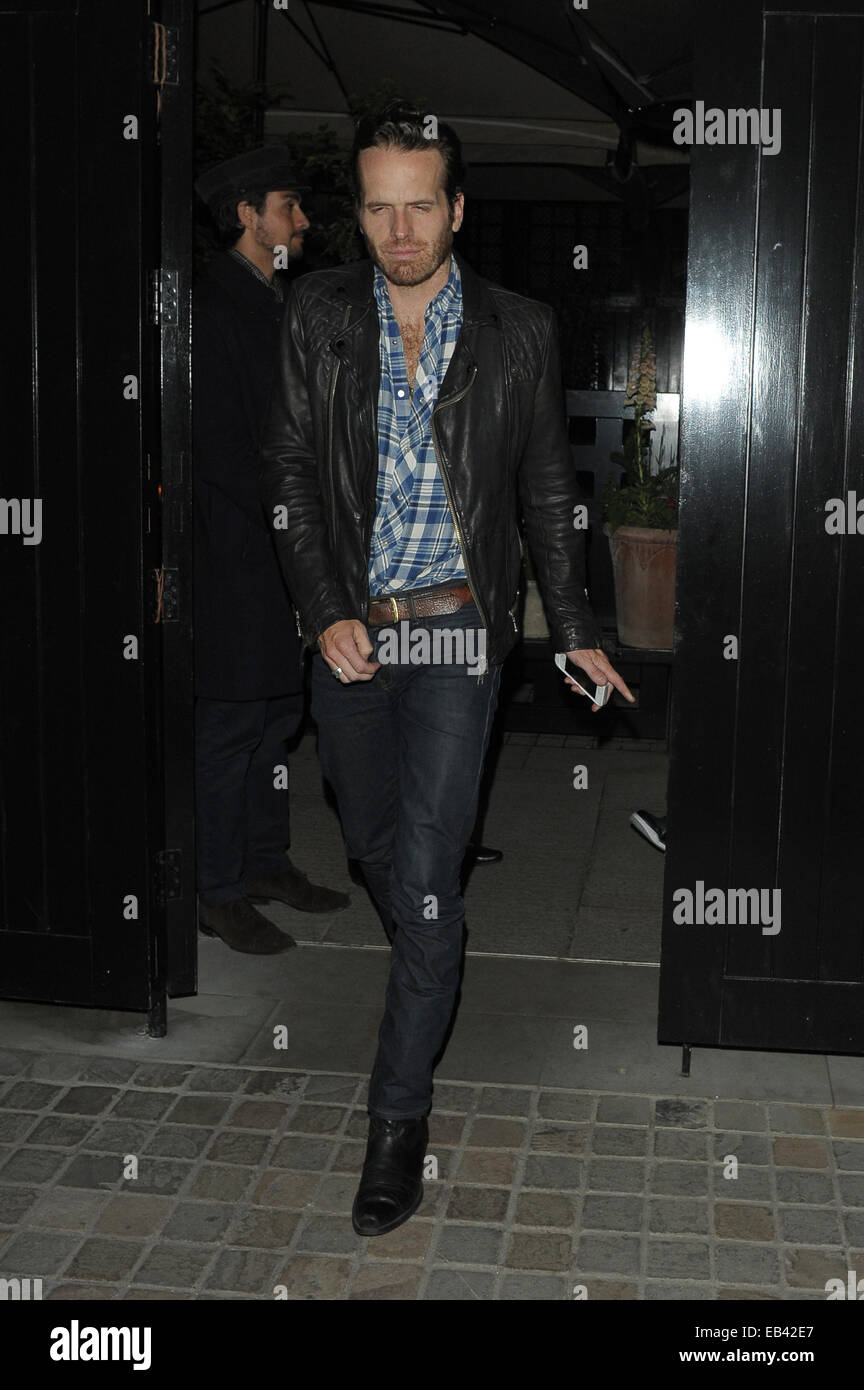 Chris Martin and Emily Blunt among celebrities spotted at Chiltern Firehouse  Featuring: Guy Berryman Where: London, United Kingdom When: 23 May 2014 Stock Photo