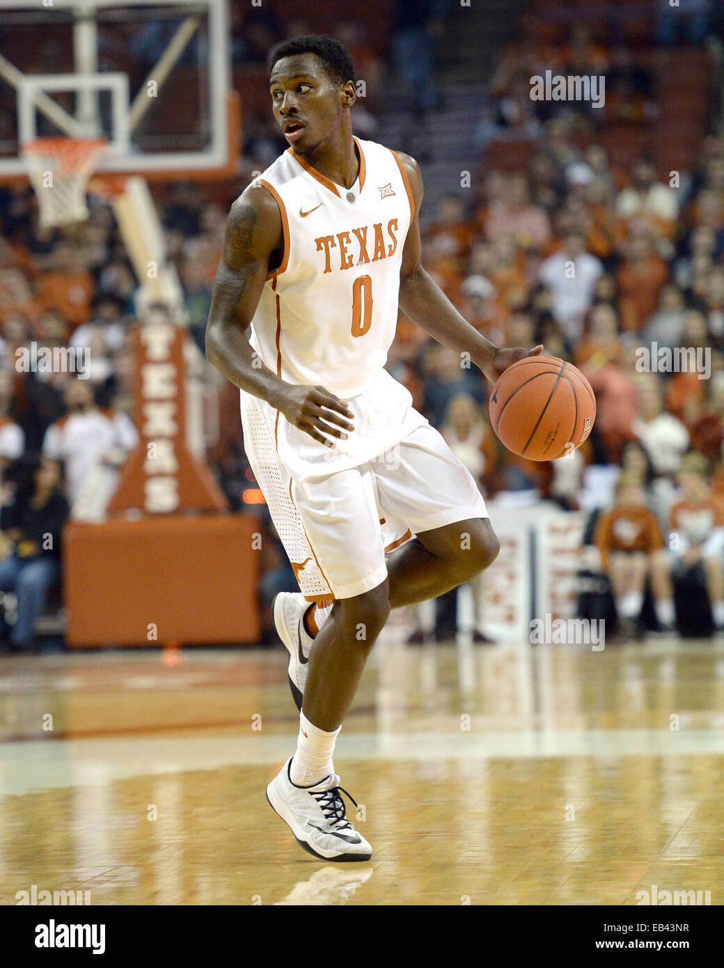 Austin, Texas. 25th Nov, 2014. Kendal Yancy #0 of the Texas Longhorns in action vs the Saint Francis Red Flash at the Frank Erwin Center in Austin Texas. Texas leads Saint Francis 36-23 at the half. Credit:  csm/Alamy Live News Stock Photo