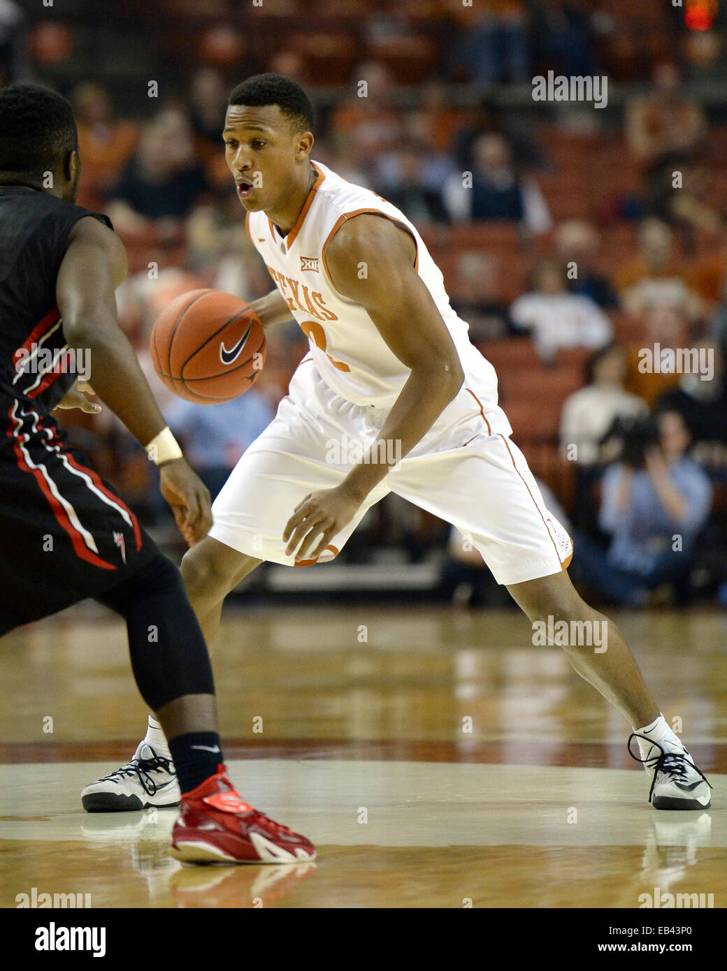 Austin, Texas. 25th Nov, 2014. Demarcus Holland #2 of the Texas Longhorns in action vs the Saint Francis Red Flash at the Frank Erwin Center in Austin Texas. Texas leads Saint Francis 36-23 at the half. Credit:  csm/Alamy Live News Stock Photo