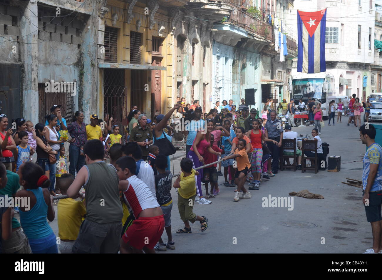 School children taking part in a sports day / tug-o-war contest on the streets of Centro Havana, Cuba Stock Photo