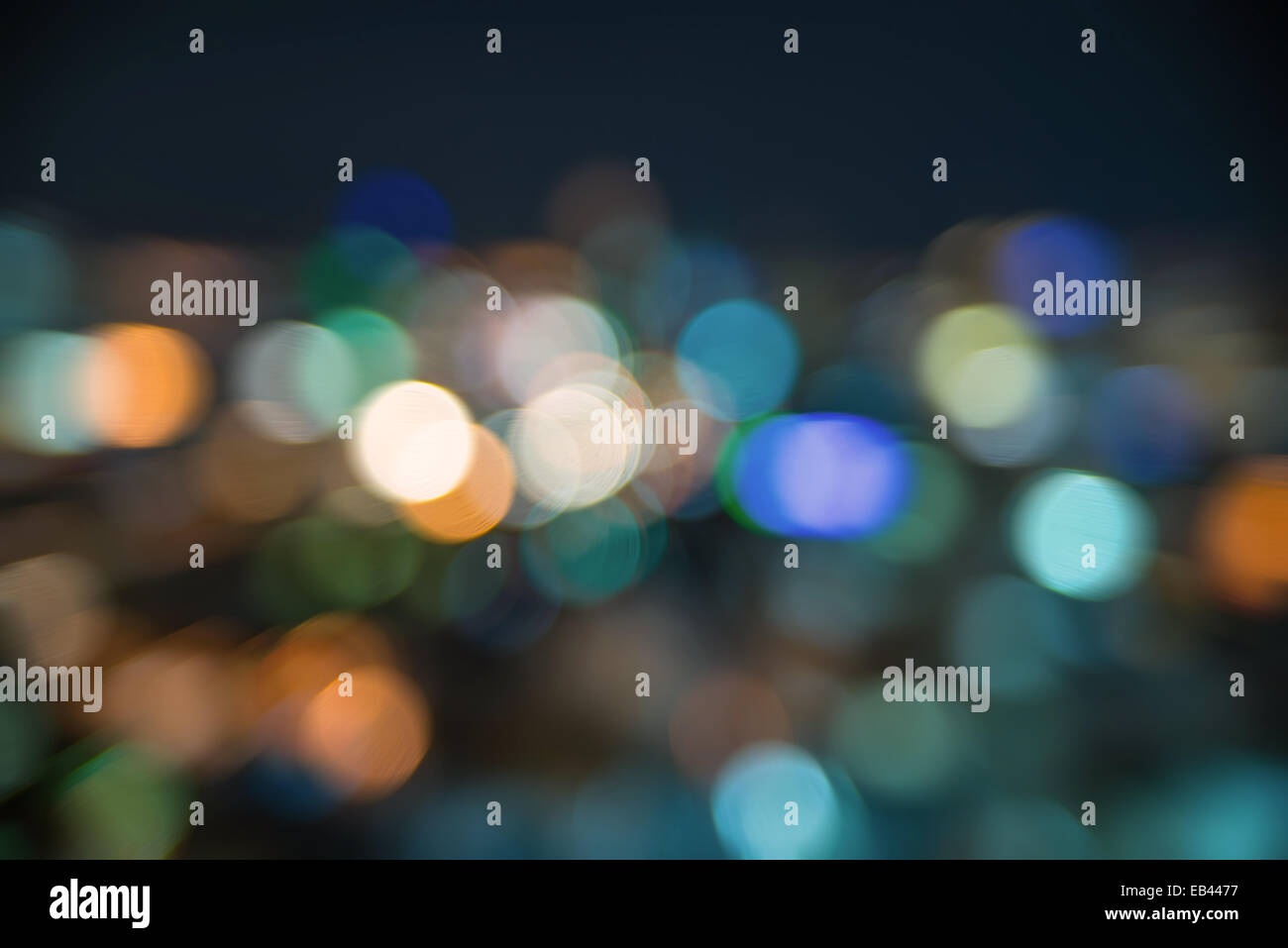 Urban city night light bokeh , defocused blur background Stock Photo