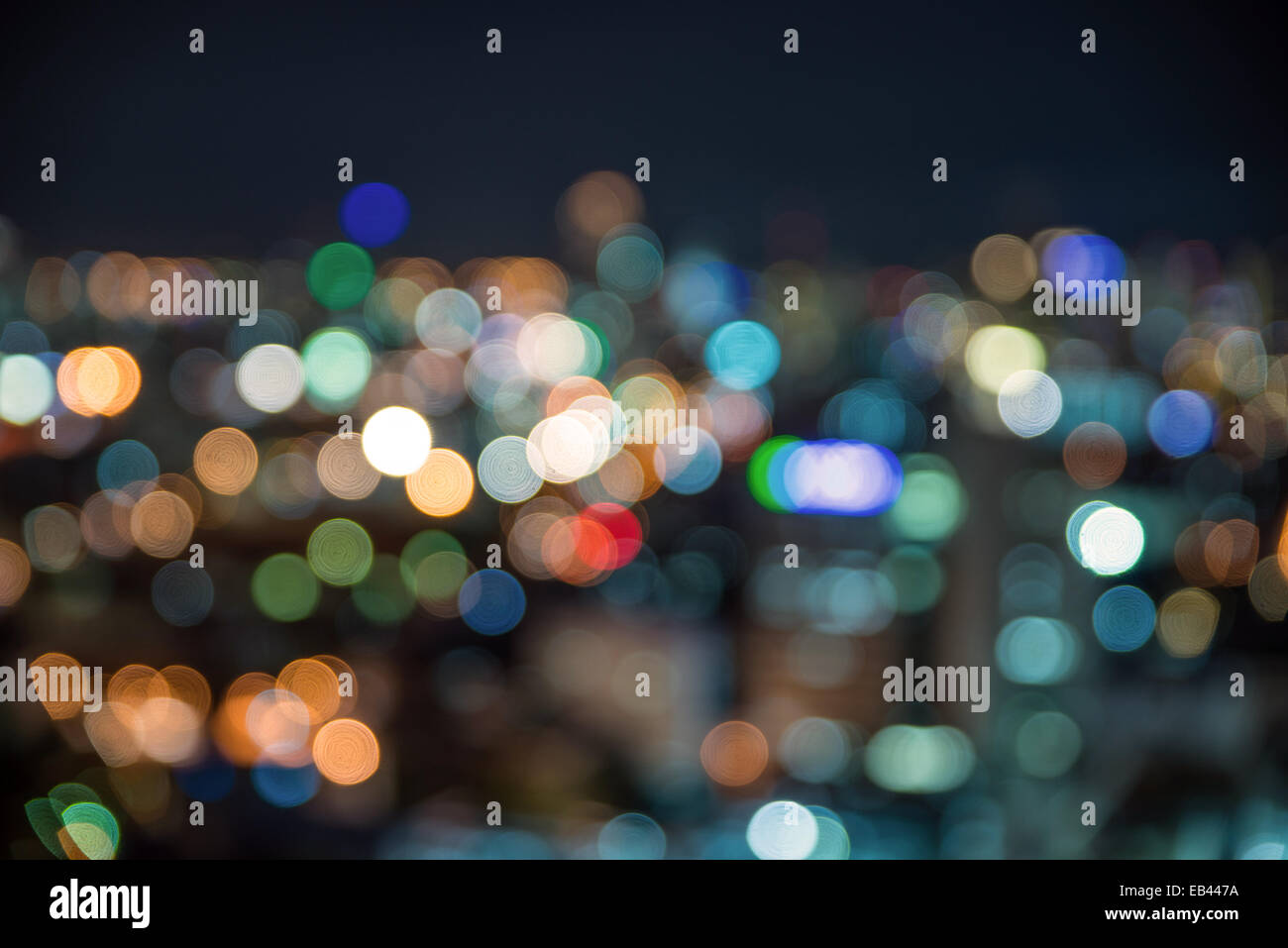 Urban city night light bokeh , defocused blur background Stock Photo