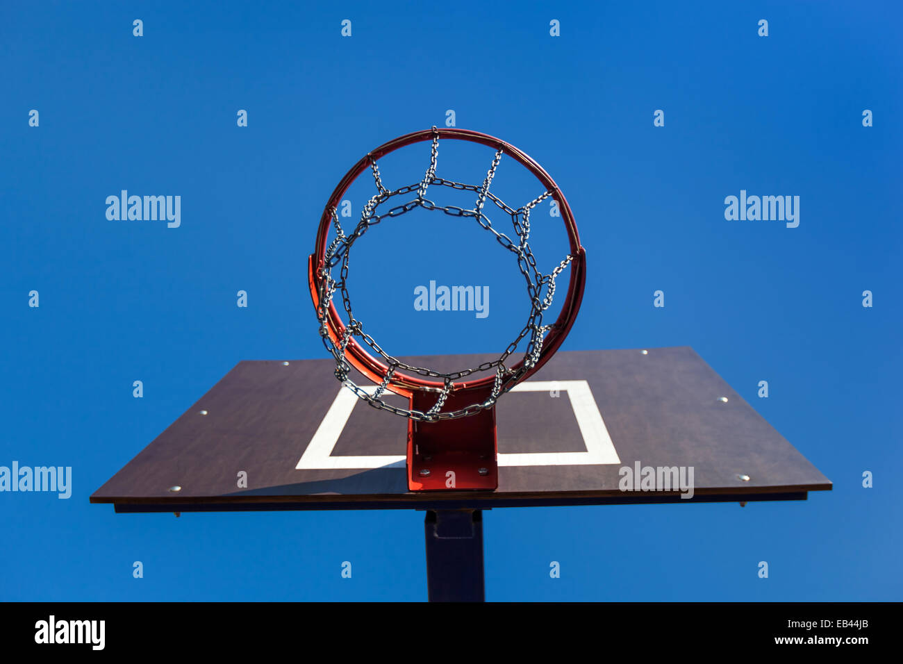 Basketball hoop on a blue sky background Stock Photo - Alamy