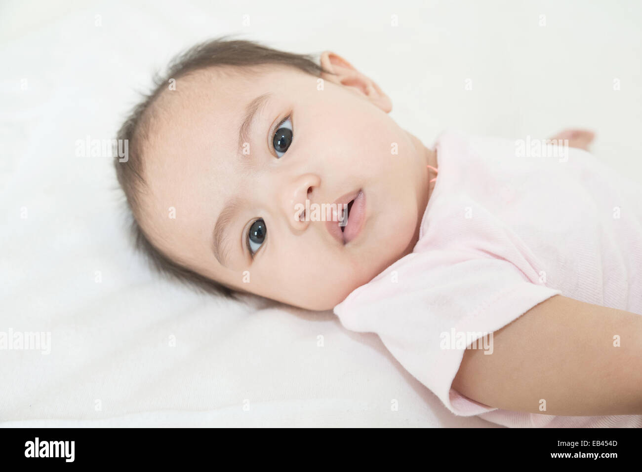 Bright portrait of adorable asian baby Stock Photo