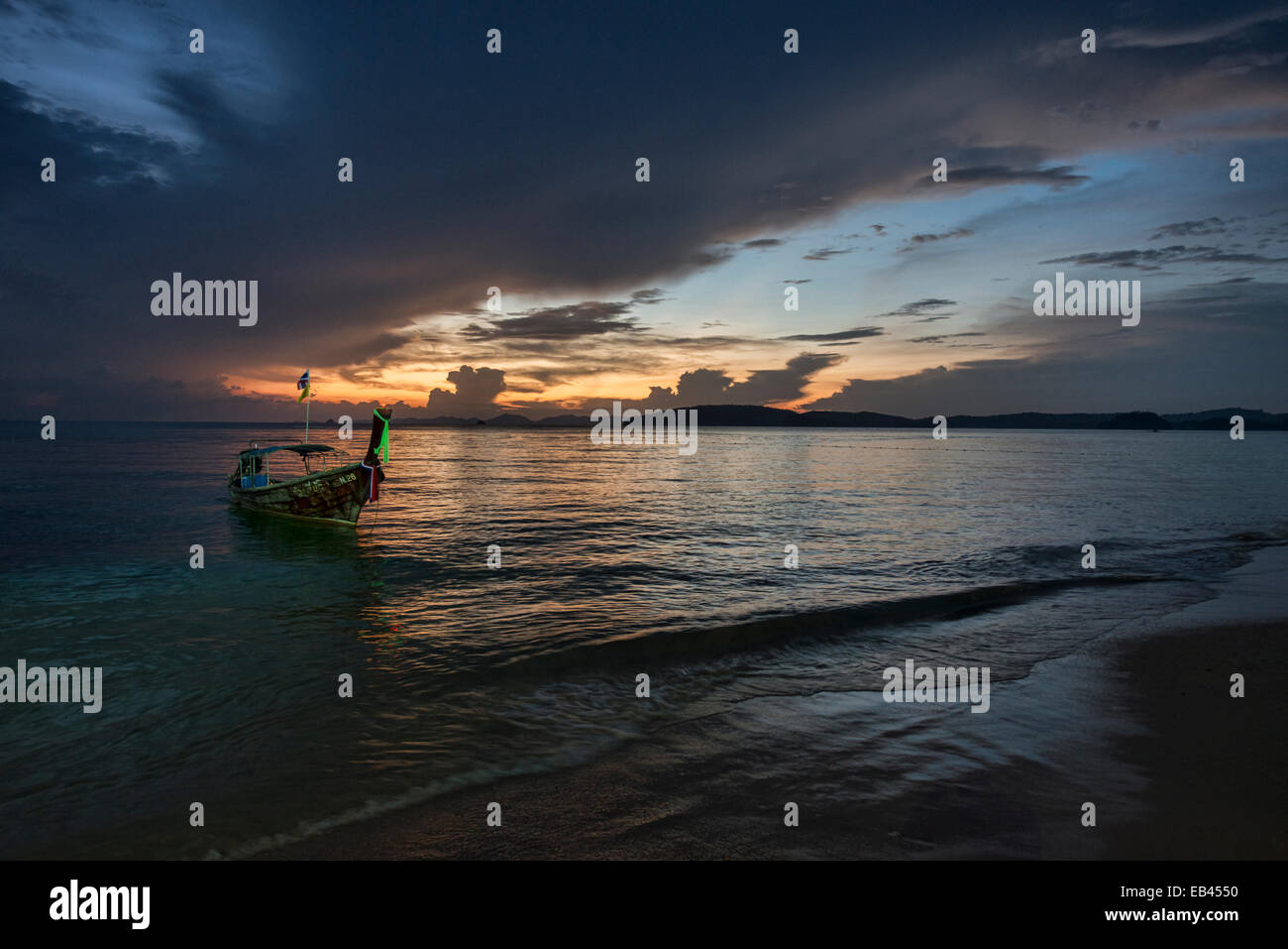 longtail boat at sunset, Ao Nang, Thailand Stock Photo