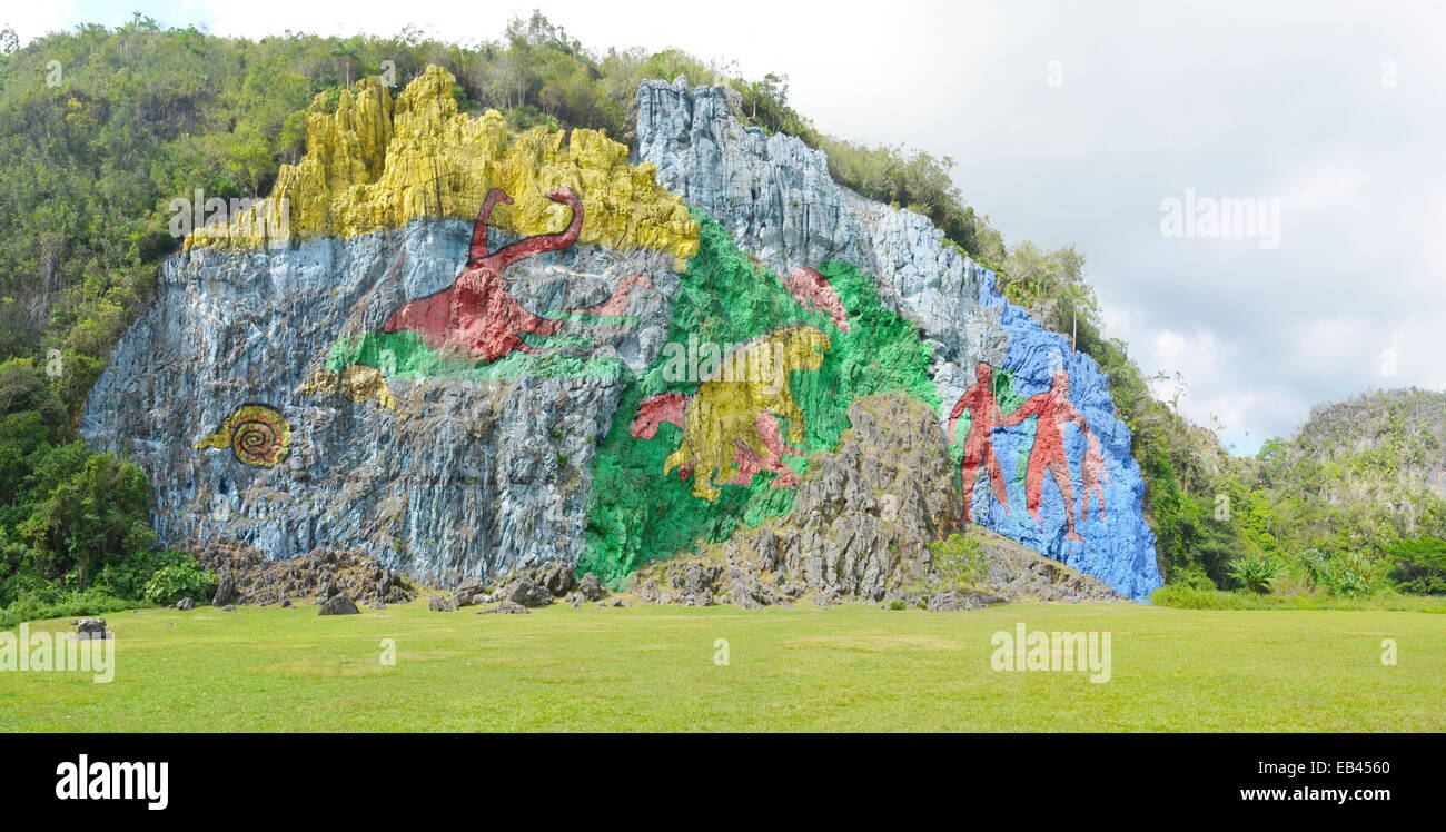 Mural de la Prehistoria, a giant mural painted on a cliff face in the Vinales area of Cuba. Stock Photo