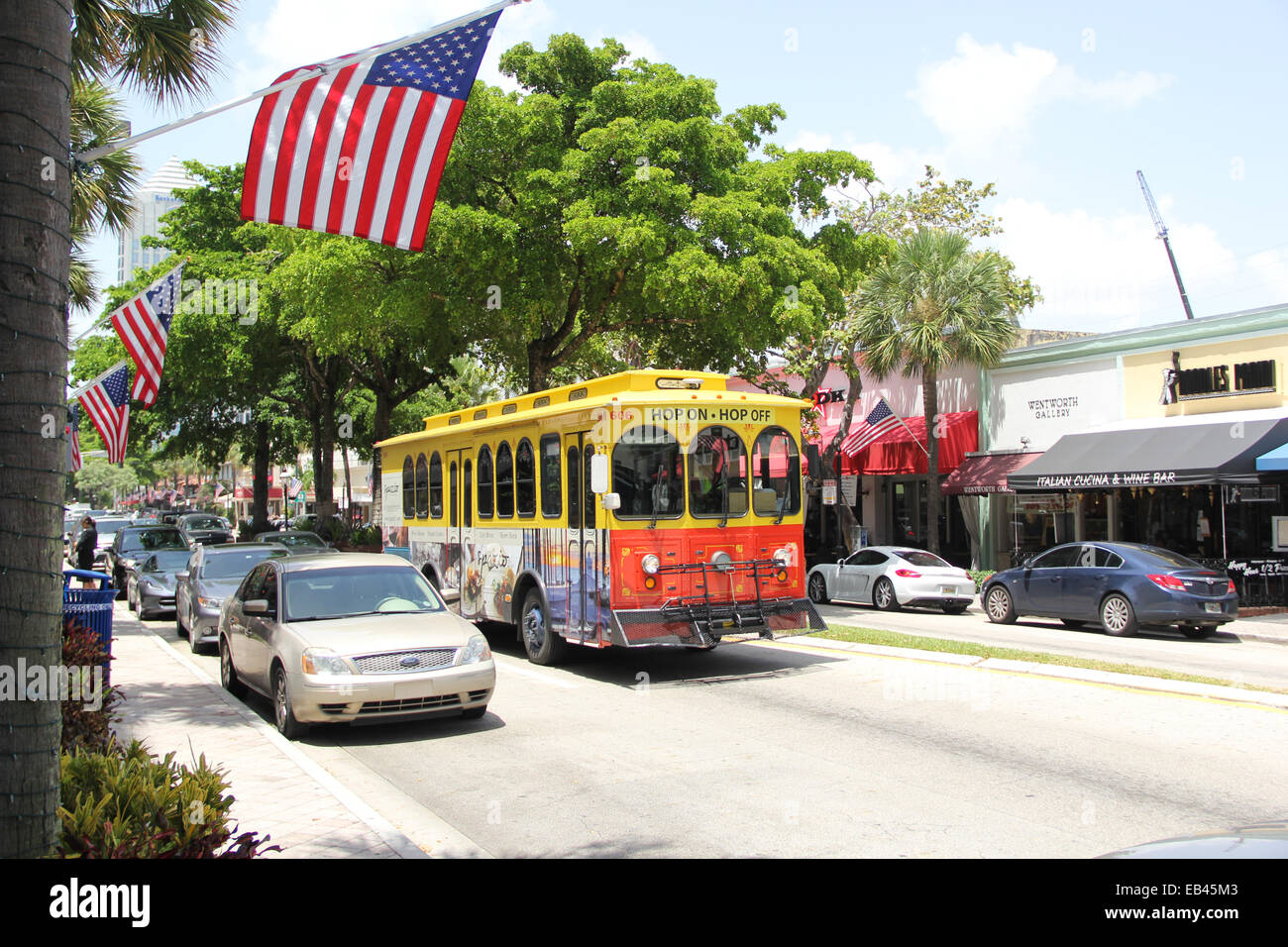 A trolley crosses Las Olas Boulevard at Fort Lauderdale, Florida