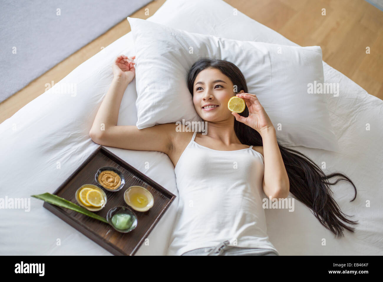 Young woman and natural facial mask Stock Photo - Alamy