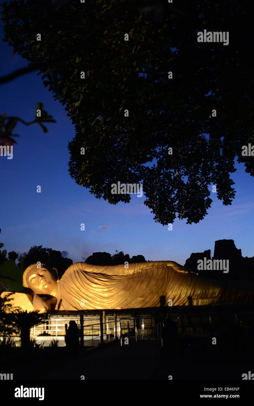 Sleeping Buddha statue at Mahavihara Majapahit in old metropolitan Trowulan. Statue with gold color has a length of 22 meters, a Stock Photo