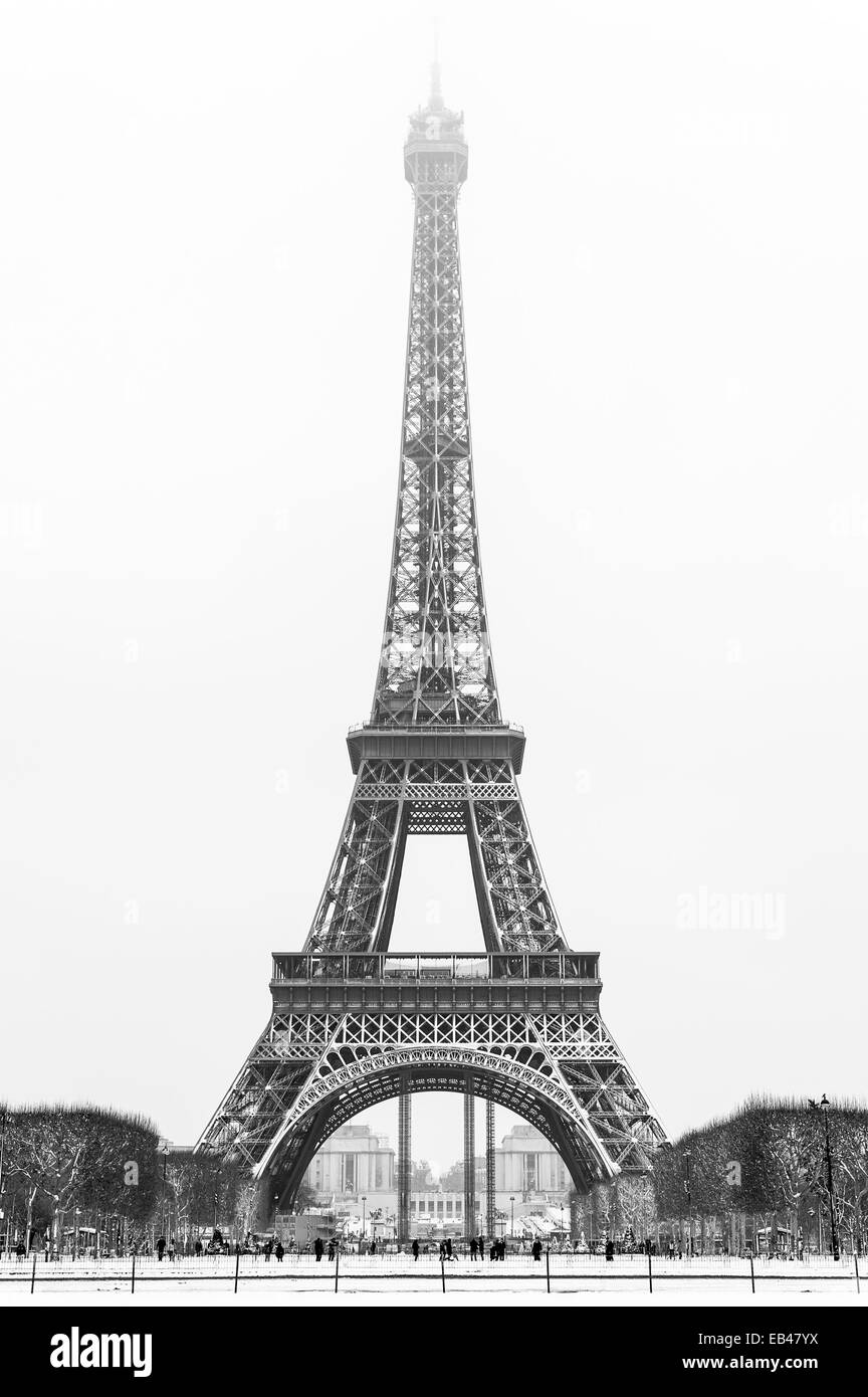 Eiffel tower under the snow in winter in black and white Stock Photo