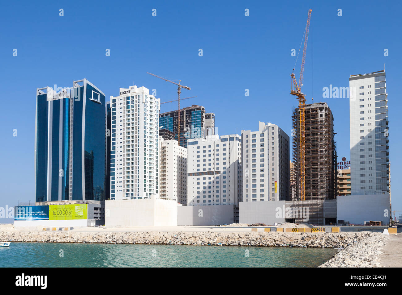 Manama, Bahrain - November 20, 2014: Modern hotels buildings are under construction. Manama city, Capital of Bahrain Kingdom Stock Photo