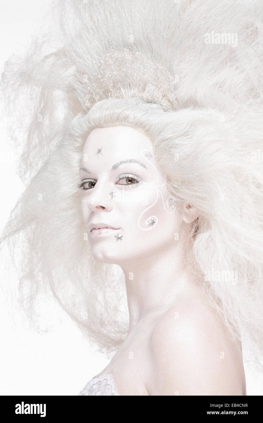 Portrait of a Woman with White Wig Posing as The Snow Queen Stock Photo