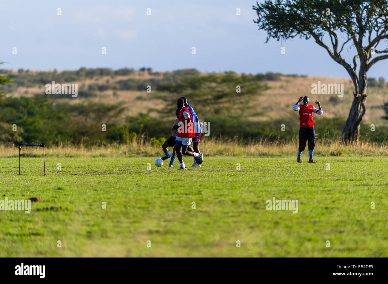 National Park rangers relaxing on their day off playing football. Stock Photo