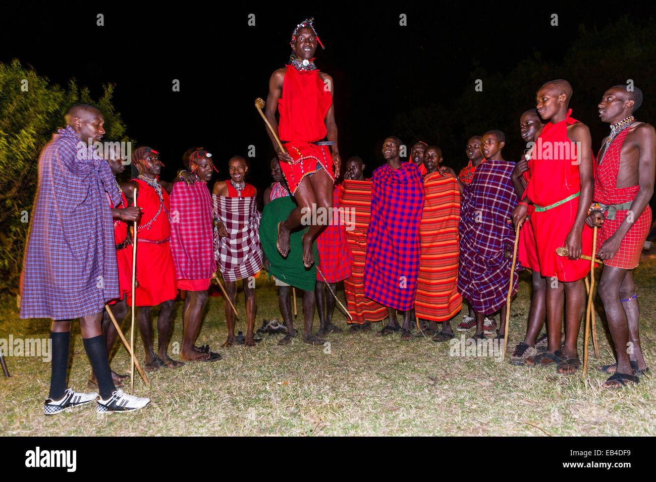 Maasai warriors jump during a ceremonial display known as a adumu or aigus. Stock Photo