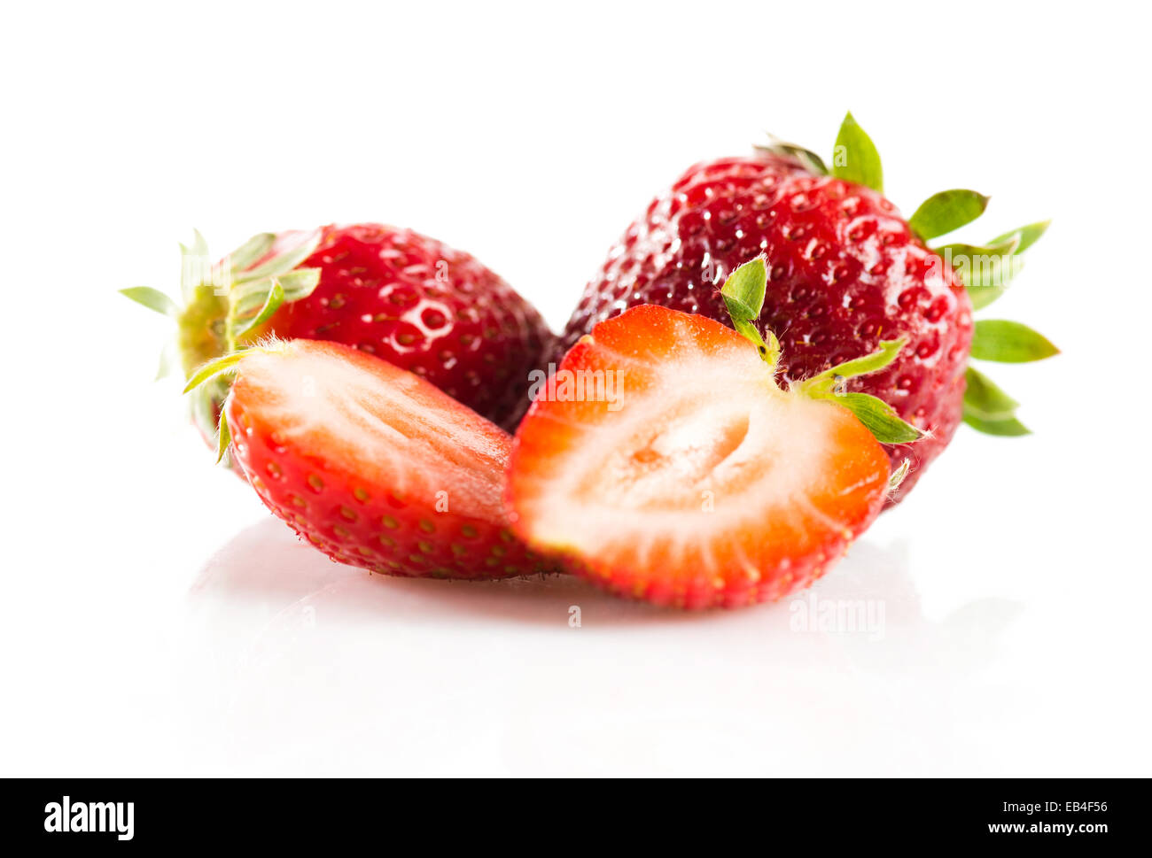 Ripe red strawberries on white background isolated Stock Photo - Alamy