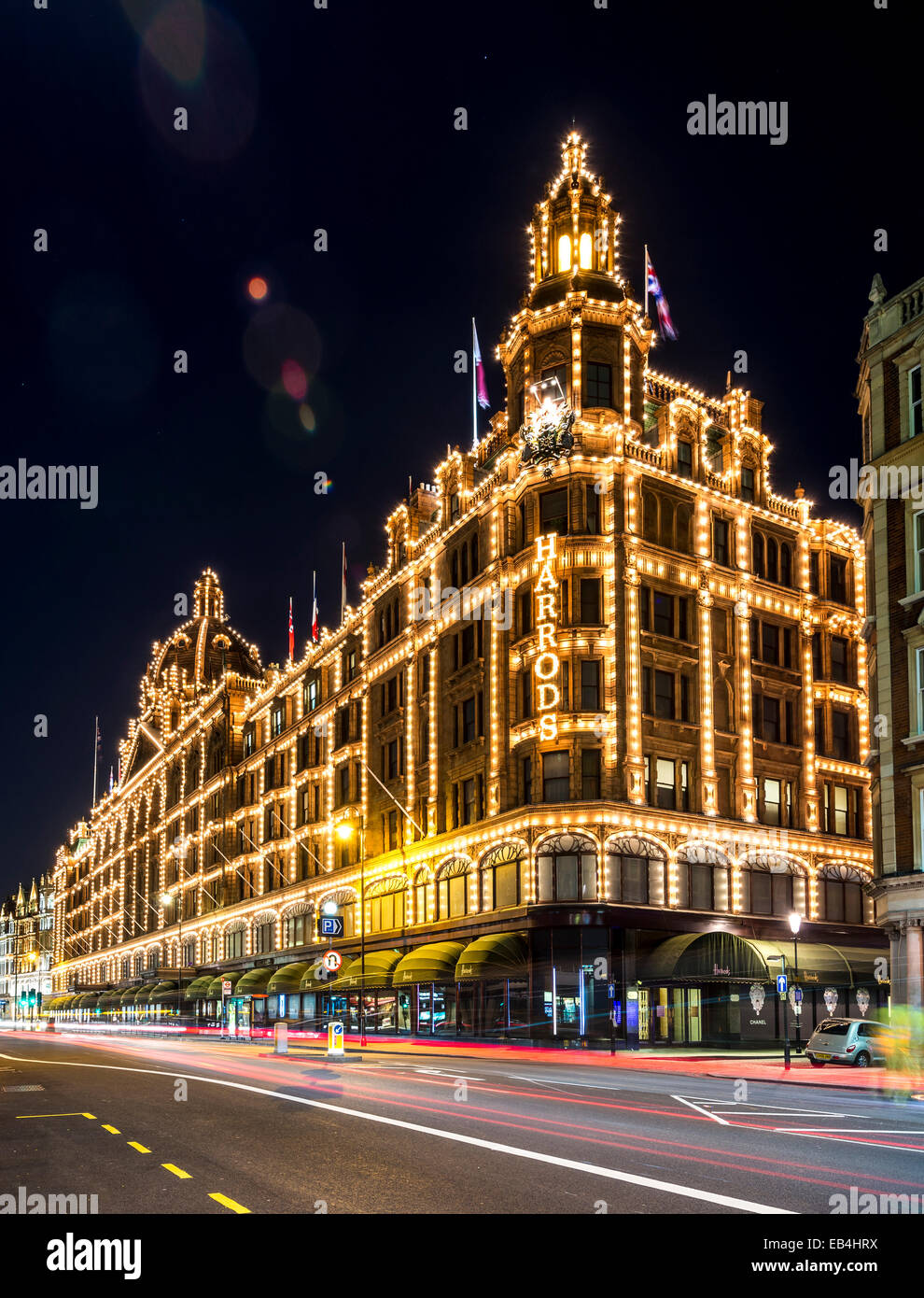 Harrods is a world famous department store in Kinightsbridge; it is lit up spectacularly at night Stock Photo