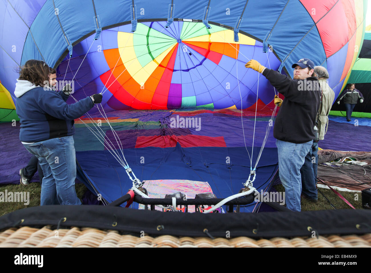 Hot air balloon operators prepare to inflate a balloon at the Prosser Balloon Rally. Stock Photo